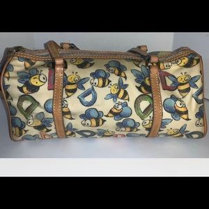 Vintage Dooney & Bourke signature Bees & D’s leather barrel bag.